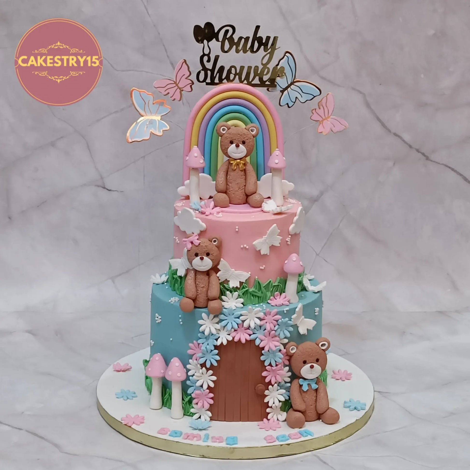 Eggless teddy theme baby shower cake 2kg chocolate flavour with fondant teddies rainbow and clouds in Noida by cakestry15