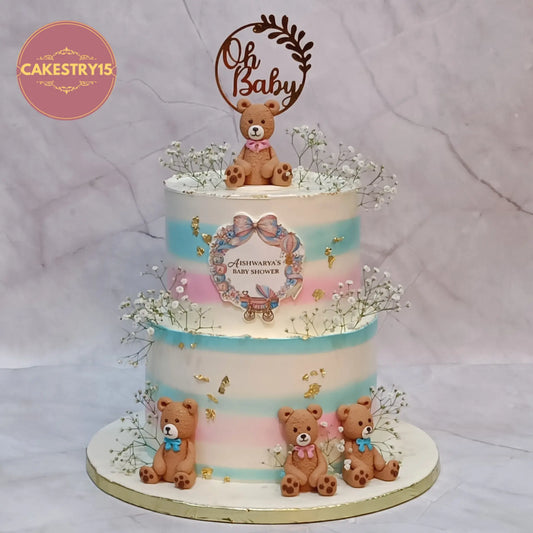 Teddy theme baby shower cake with baby breath and oh baby topper eggless choco butterscotch cake in Noida