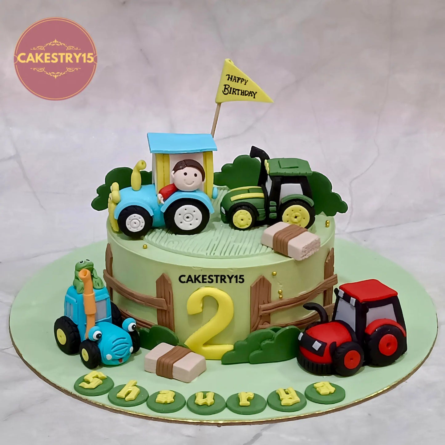 Eggless tractor theme kids birthday cake in Noida with greenery and tractor design for a premium themed celebration.