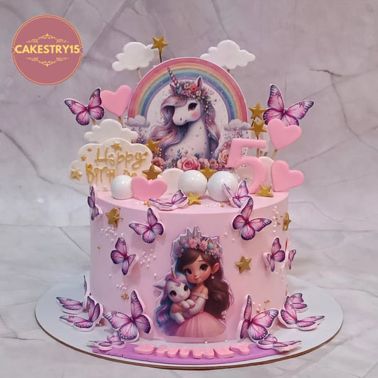 Eggless unicorn 5th kids birthday cake with edible unicorn image, butterflies and fondant decorations, handcrafted as a premium theme cake in Noida.