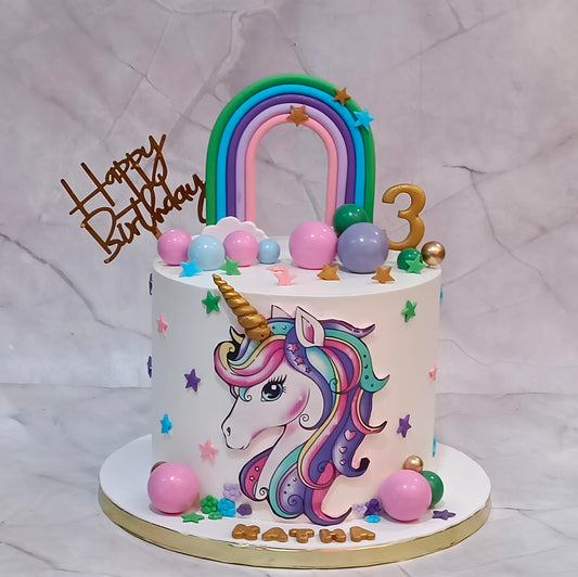 Unicorn Rainbow & Clouds 3rd Birthday Cake with an edible unicorn image, fondant rainbow, faux balls, clouds and stars.
