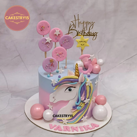 Eggless unicorn kids birthday cake with black forest flavour and magical theme cake design in Noida for girls birthday celebrations.