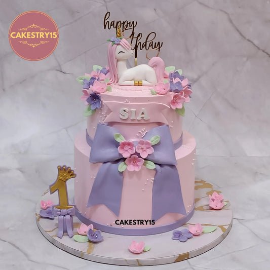 Unicorn theme first birthday cake for girls in choco vanilla flavour, eggless custom cake by Cakestry15 Noida