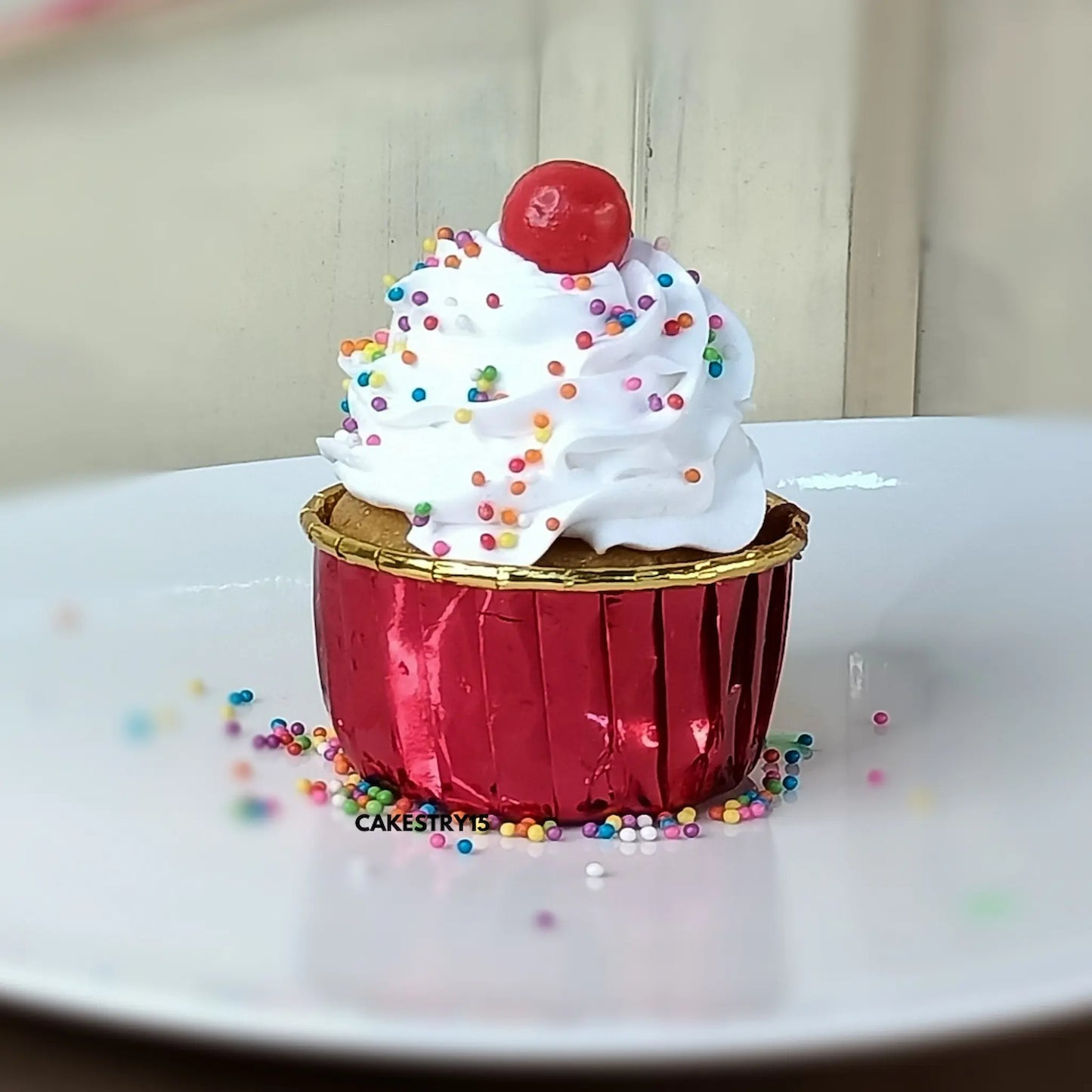 Eggless vanilla cupcakes with whipped cream and cherry topping by Cakestry15