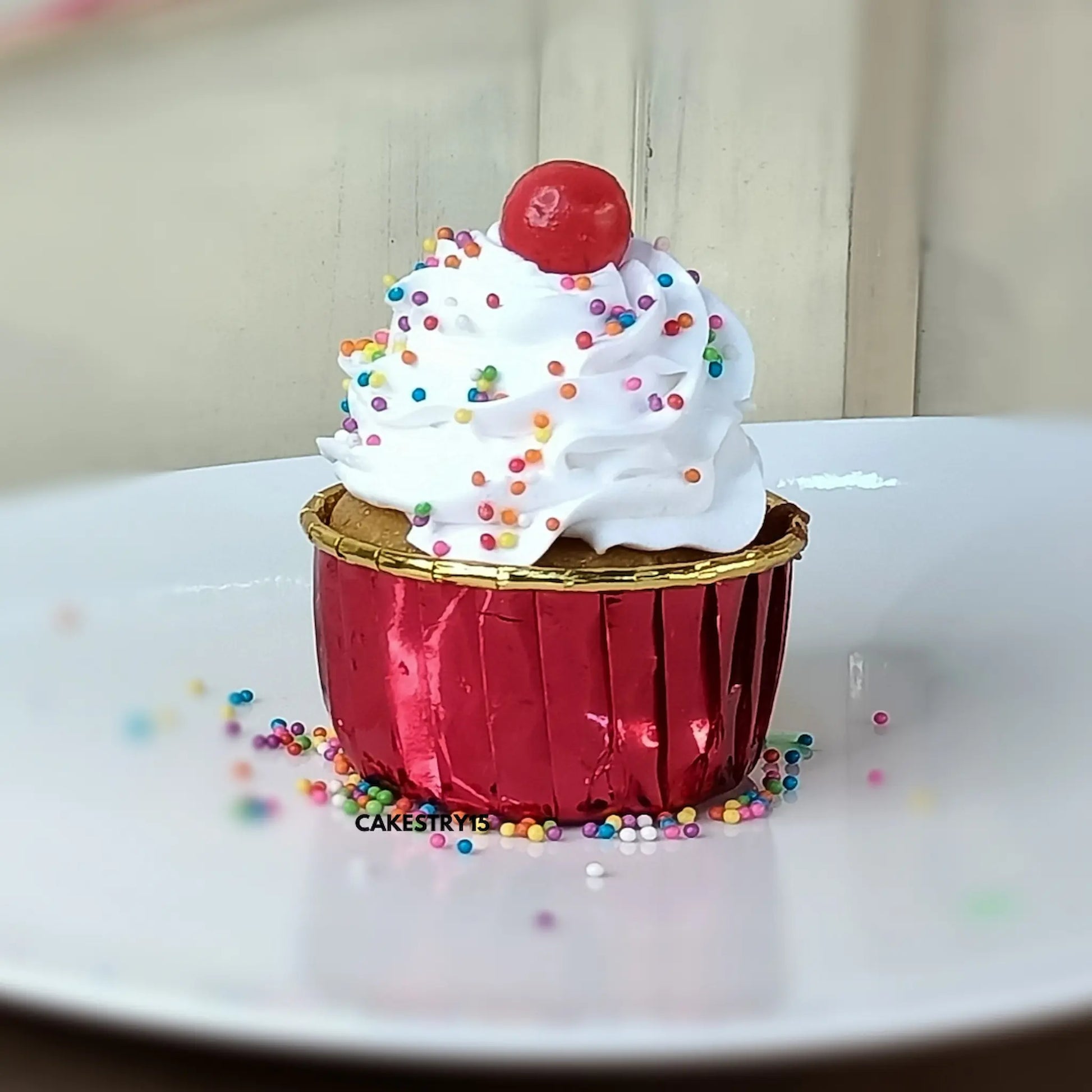 Eggless vanilla cupcakes with whipped cream and cherry topping by Cakestry15