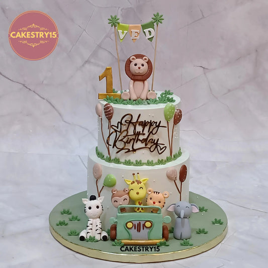 2kg pineapple jungle theme 2 tier birthday cake with fondant lion, monkey, giraffe, tiger, zebra, elephant and balloons from Cakestry15 Noida
