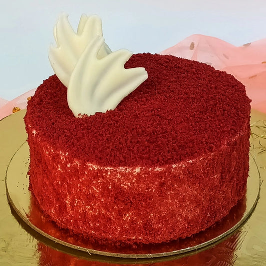 Red velvet cake with whipped cream, mascarpone layers, and chocolate garnish by Cakestry15