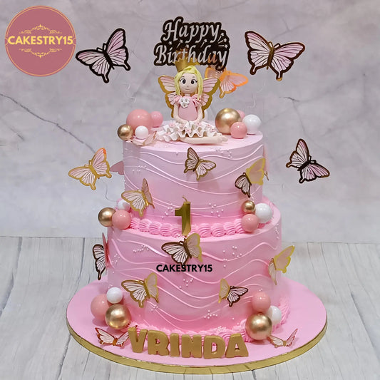 Butterfly theme 2-tier 5kg eggless first birthday cake for girl with topper from Cakestry15

