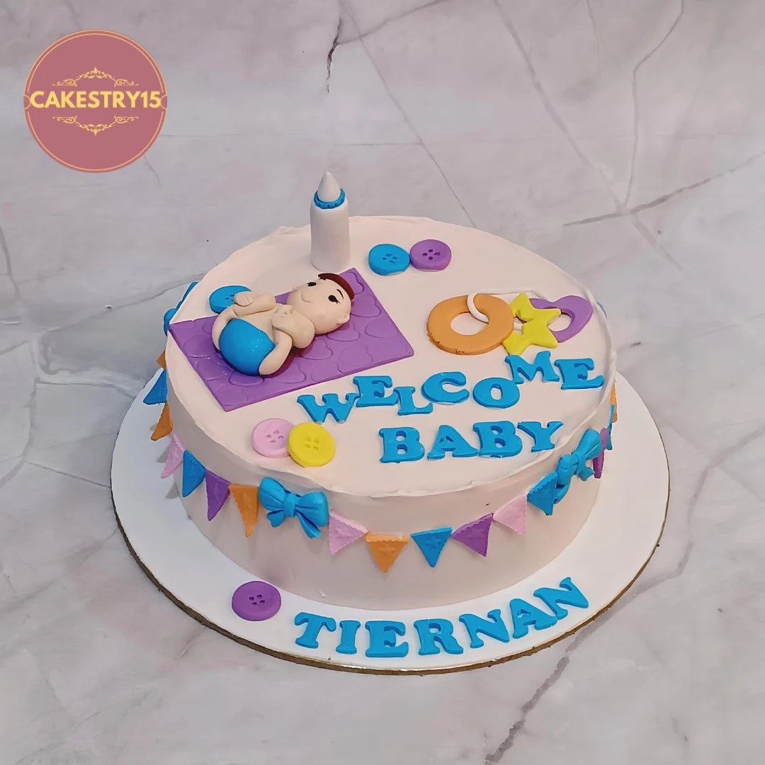 Welcome baby boy kids birthday cake design with fondant baby topper, a premium theme cake Noida creation made from eggless cakes.