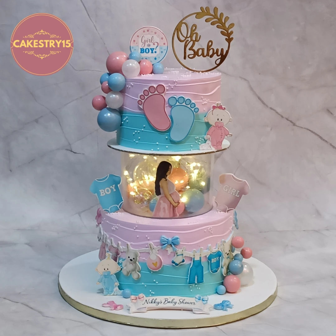 Welcome Baby Grand Reveal Cake featuring baby-themed decorations, a premium theme cake Noida design crafted as one of our signature eggless cakes for special family celebrations.